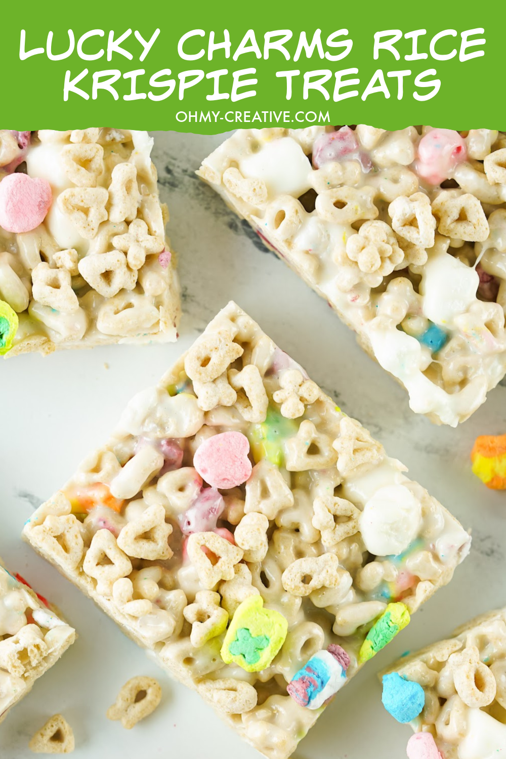 A tray of cut Lucky Charms Rice Krispie Treat bars.