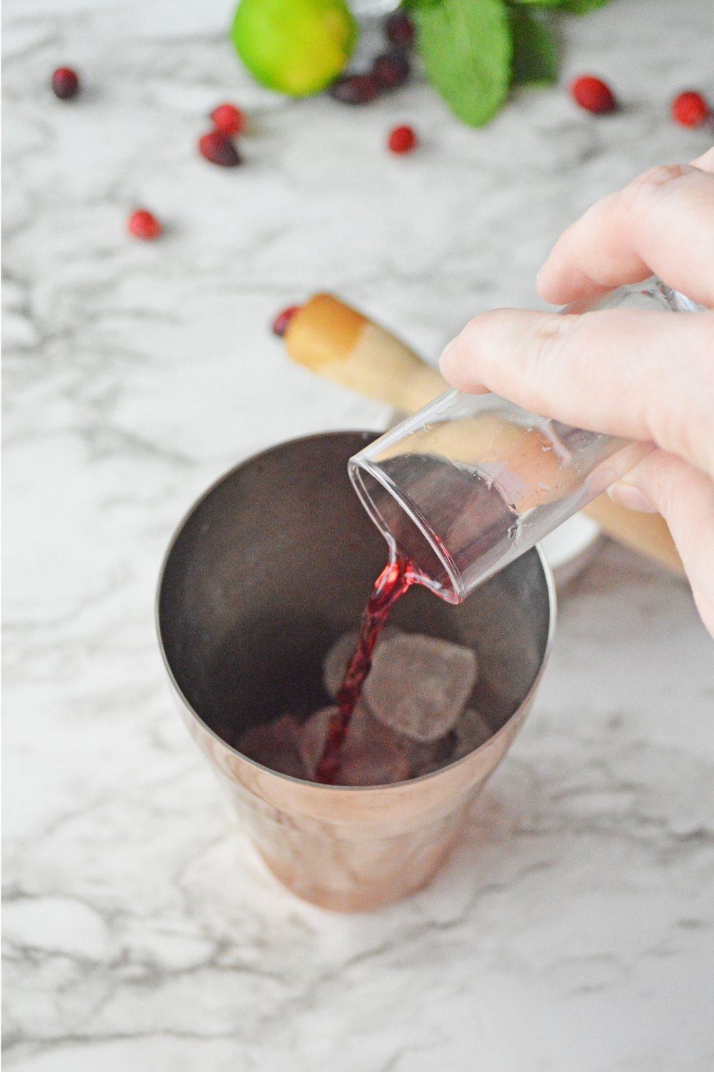 Add cranberry mojito to shaker along with rum to make a cranberry mojito recipe.