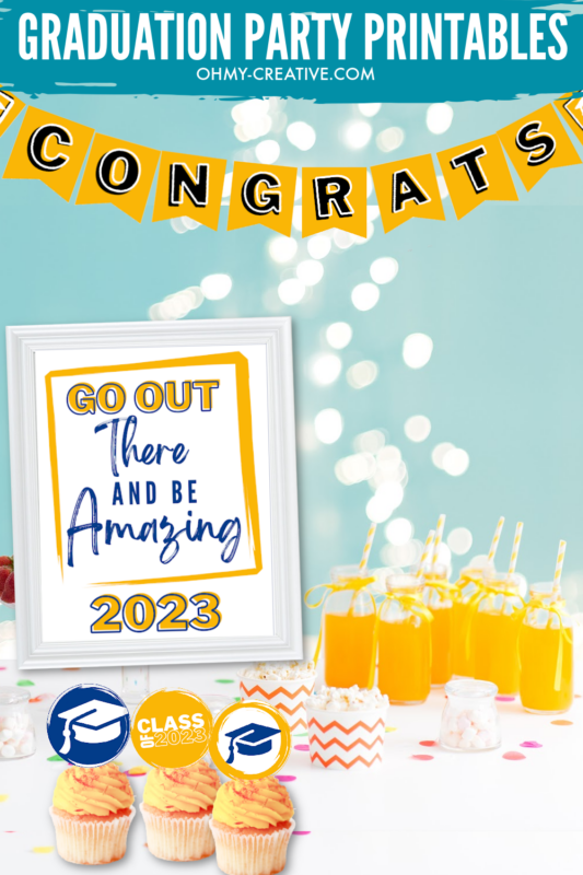 Graduation party table with a printable "Go out there and be amazing" sign, printable cupcake toppers on cupcakes and orange drinks with straws.