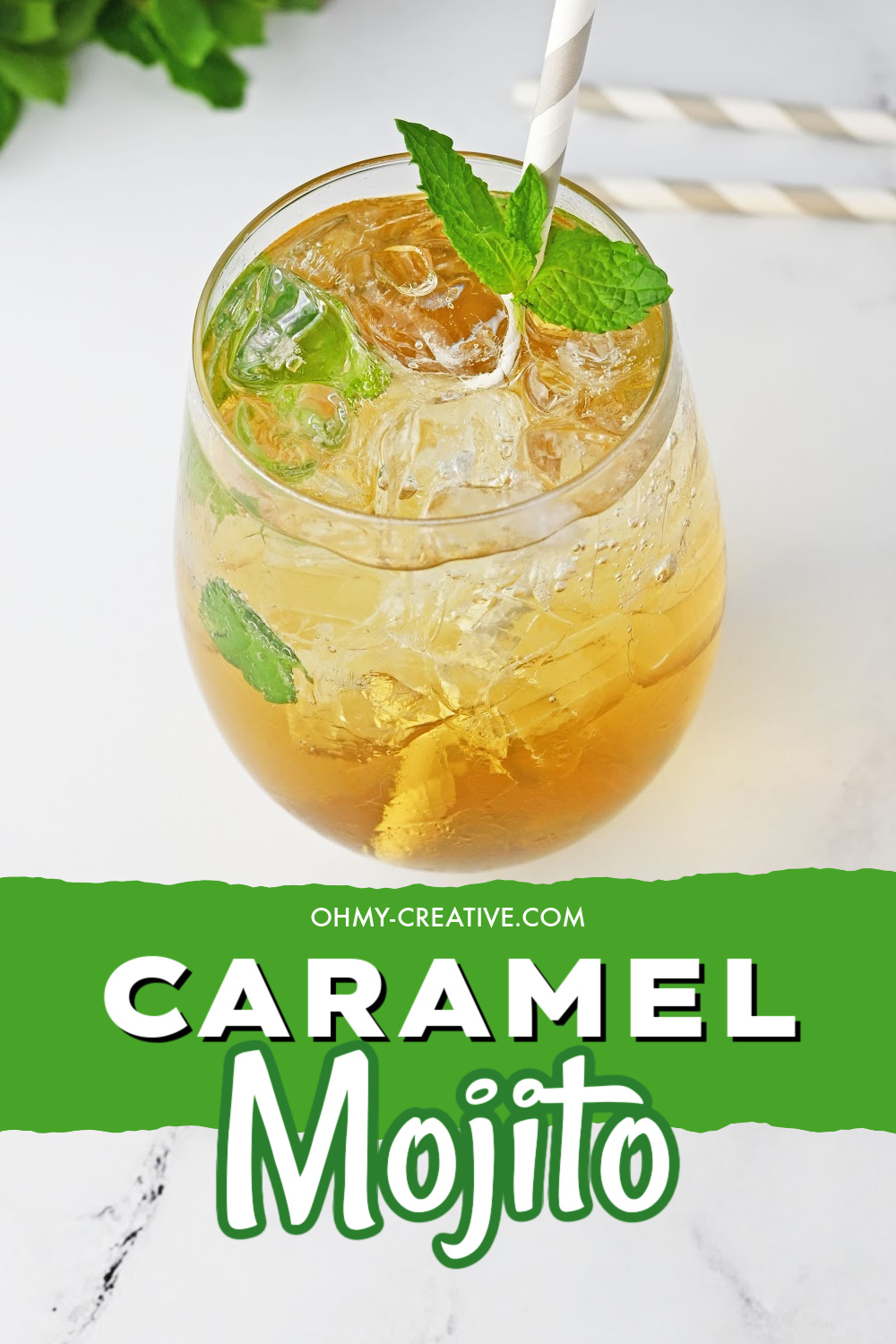 A caramel mojito cocktail garnished with mint and a straw. Pinterest image