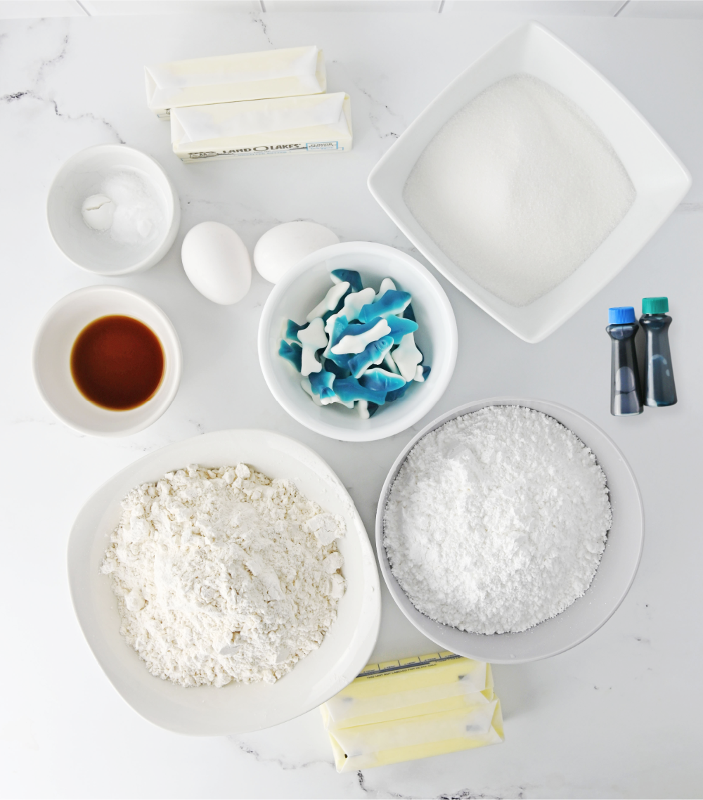 white bowls of ingredients to make shark sugar cookies