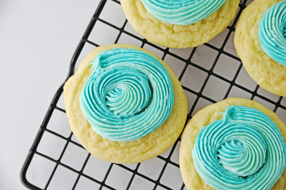 sugar cookie with swirled blue icing.