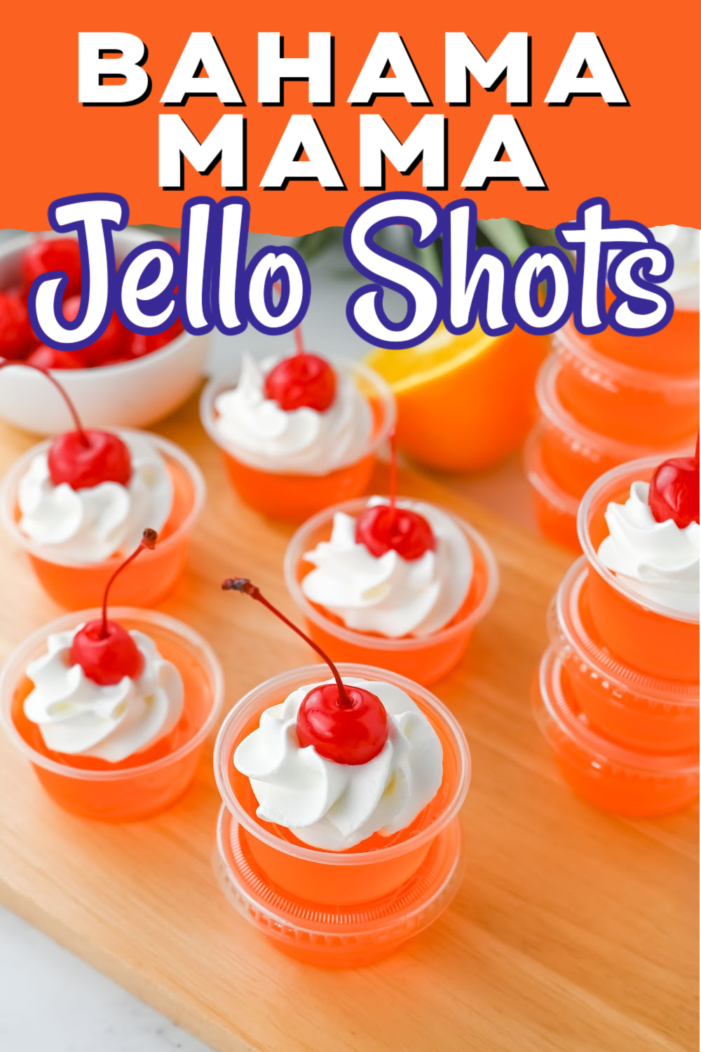 Pin image of Bahama Mama Jello shots with whipped cream and a cherry on top.