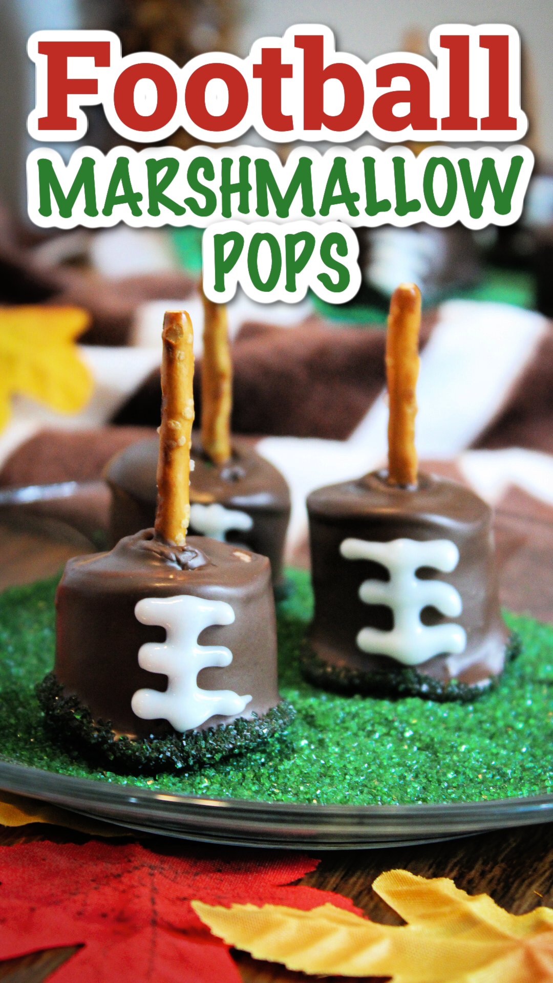 Pin image of super bowl Marshmallow pops. These game day treats are sitting in a dish of green sprinkle sugar.