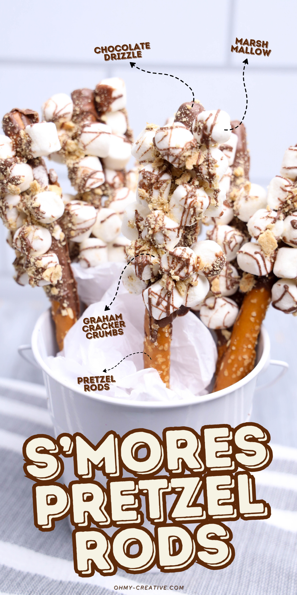 An image of Smores Pretzel Rods you can make for your next camping trip!